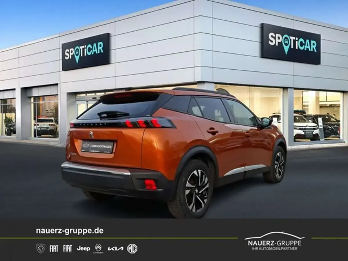 Gebraucht Peugeot e-2008 Allure 100 kW (136 PS) 2022 Orange SUV