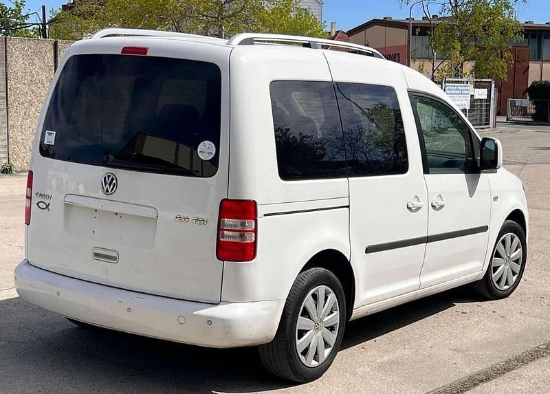 Second-hand VW Caddy Highline 140 CP (102 kW) 2013 Alb Monovolum