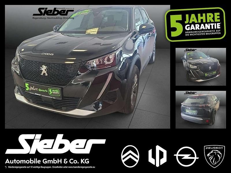 Schwarz perla nera Gebraucht 2022 Peugeot e-2008 Active SUV | 17.790 € (Superpreis) - Bild 1/4
