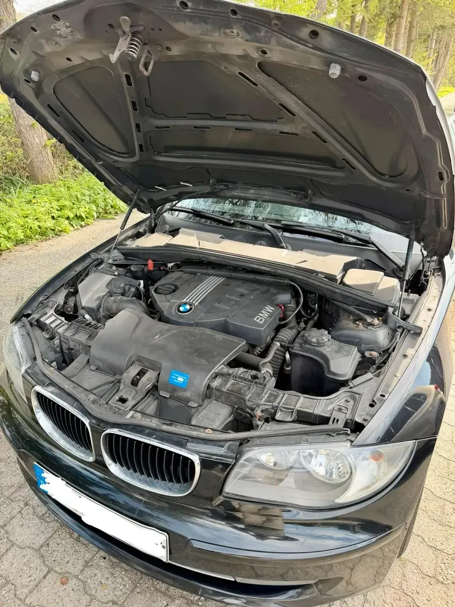 Używany BMW 116 116 KM (85 kW) 2011 Czarny Hatchback