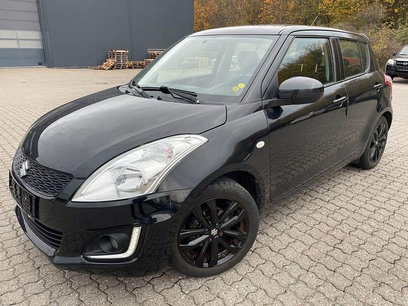 Schwarz Gebraucht 2016 Suzuki Swift Comfort Limousine | 4.401 € (Fairer Preis) - Bild 1/4