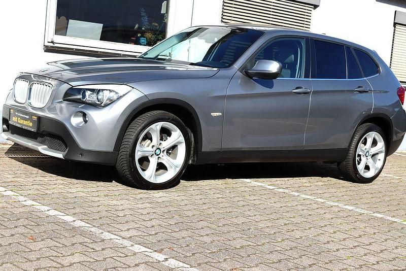 Spacegrau Gebraucht 2011 BMW X1 Sport Line SUV | 13.390 € (Fairer Preis) - Bild 1/4