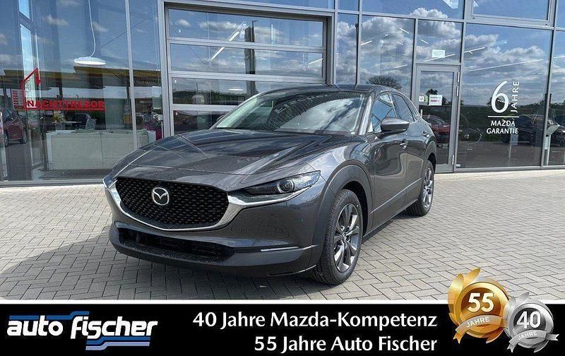Machine gray Neu 2025 Mazda CX-30 Exclusive-Line SUV | 34.190 € - Bild 1/4