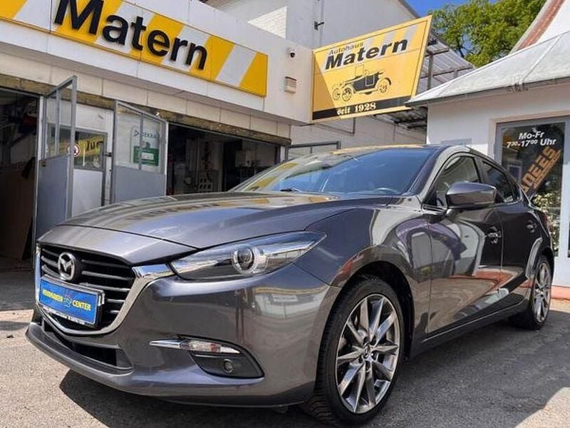Grau Gebraucht 2018 Mazda 3 Kizoku Limousine | 15.490 € (Etwas zu teuer) - Bild 1/4