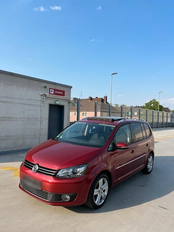Rot Gebraucht 2011 VW Touran Van / Kleinbus | 5.650 € (Superpreis) - Bild 1/4