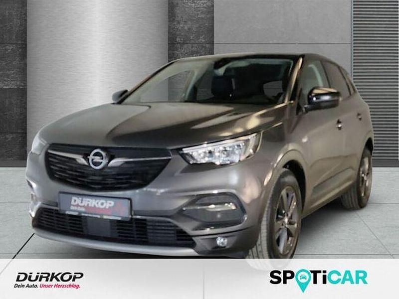 Mondstein grau/e:vulkan grau Gebraucht 2021 Opel Grandland X Design Edition SUV | 17.950 € (Fairer Preis) - Bild 1/4