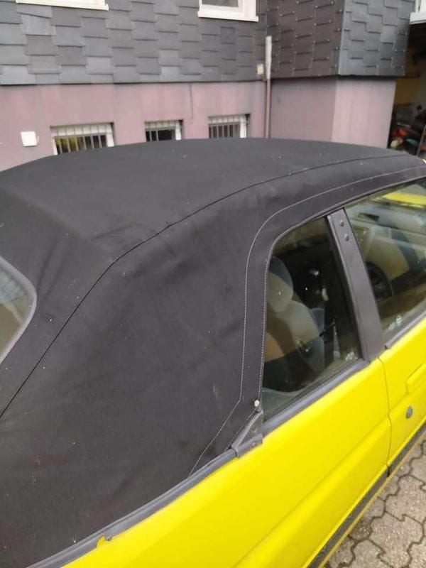 Gebraucht Ford Escort Cabriolet 105 PS (77 kW) 1994 Gelb Cabrio