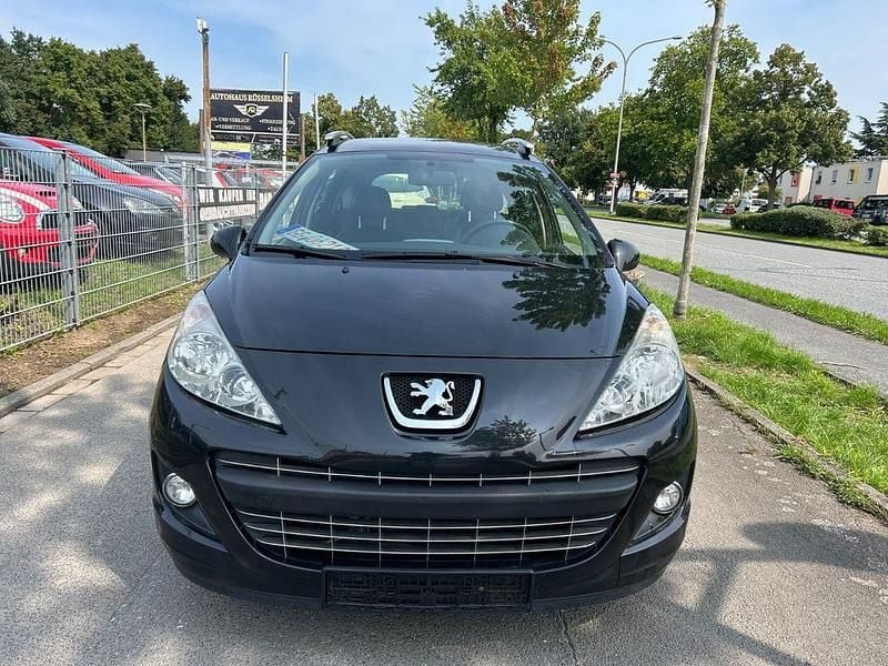 Gebraucht Peugeot 207 Premium 111 PS (81 kW) 2012 Schwarz Kombi