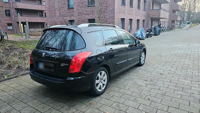 Gebraucht Peugeot 308 Active 112 PS (82 kW) 2013 Schwarz Kombi