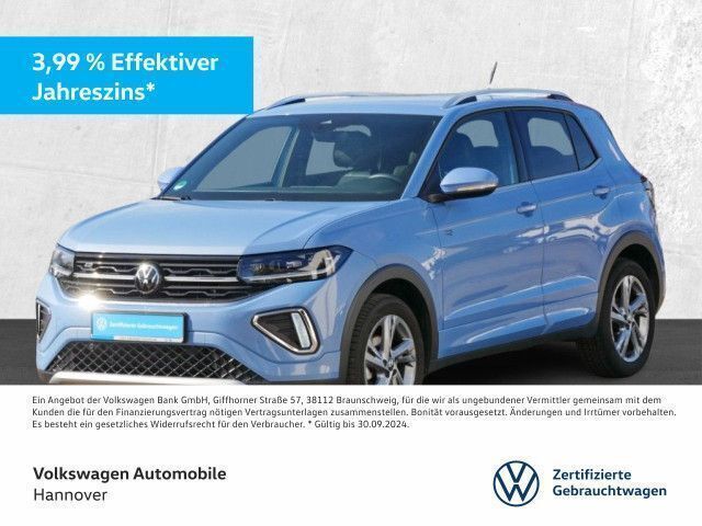 Clear blue metallic Gebraucht 2024 VW T-Cross R-line SUV | 26.970 € (Fairer Preis) - Bild 1/2