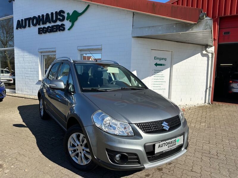 Grau Gebraucht 2012 Suzuki SX4 Style SUV | 8.480 € (Fairer Preis) - Bild 1/4