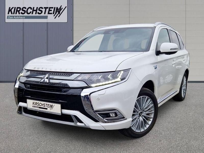 Weiss Gebraucht 2019 Mitsubishi Outlander P-HEV Top SUV | 21.990 € (Fairer Preis) - Bild 1/4