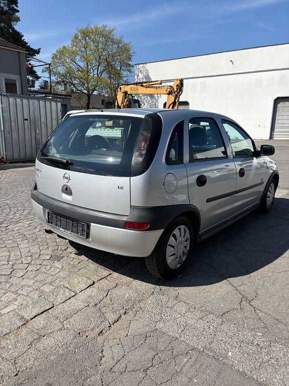 Second-hand Opel Corsa Njoy 75 CP (55 kW) 2002 Argintiu Hatchback