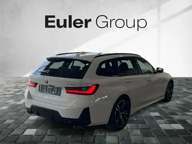 Gebraucht BMW 330 Performance 286 PS (210 kW) 2024 Weiss Kombi