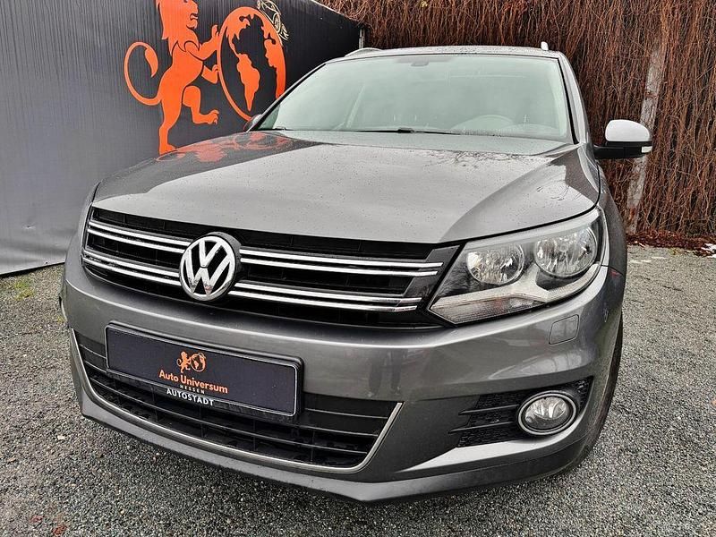 Grau Gebraucht 2014 VW Tiguan SUV | 9.990 € (Fairer Preis) - Bild 1/4