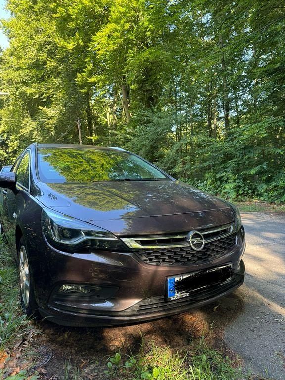 Braun Gebraucht 2016 Opel Astra Innovation Kombi | 7.099 € (Guter Preis) - Bild 1/4