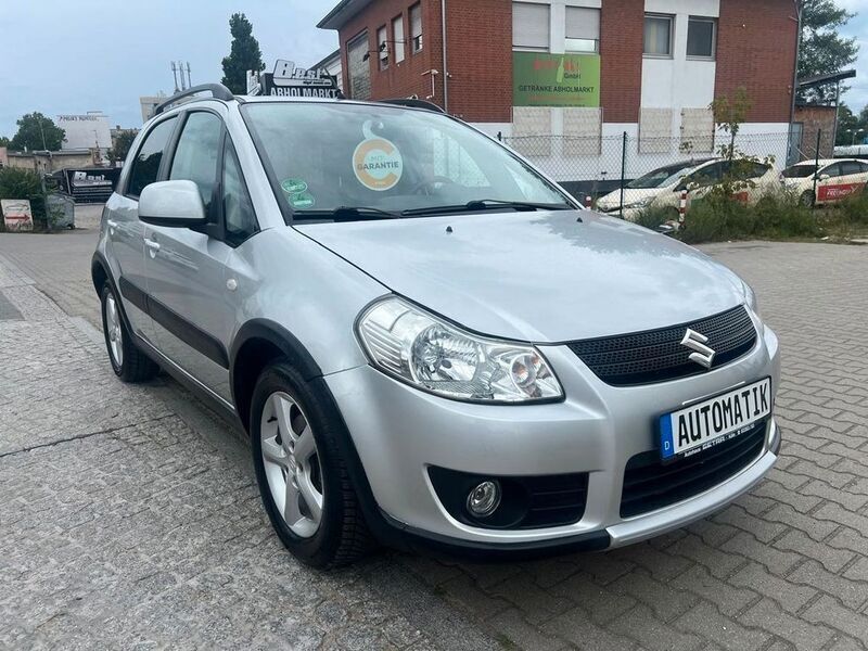 Grau Gebraucht 2008 Suzuki SX4 Club SUV | 7.490 € (Teuer) - Bild 1/4