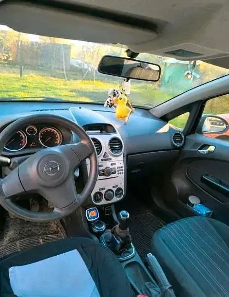 Second-hand Opel Corsa 59 CP (43 kW) 2008 Negru Hatchback