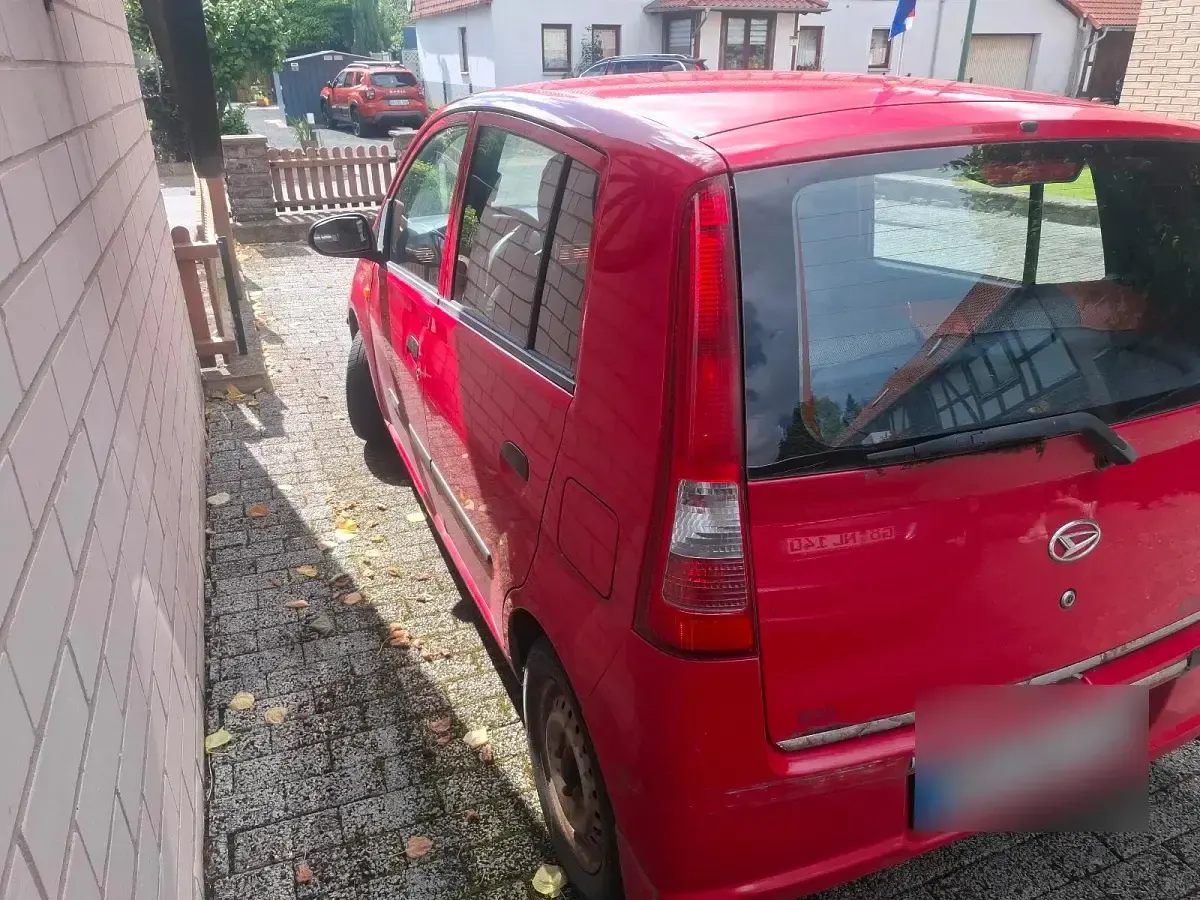 Gebraucht Daihatsu Cuore Plus 58 PS (42 kW) 2001 Rot Kleinwagen