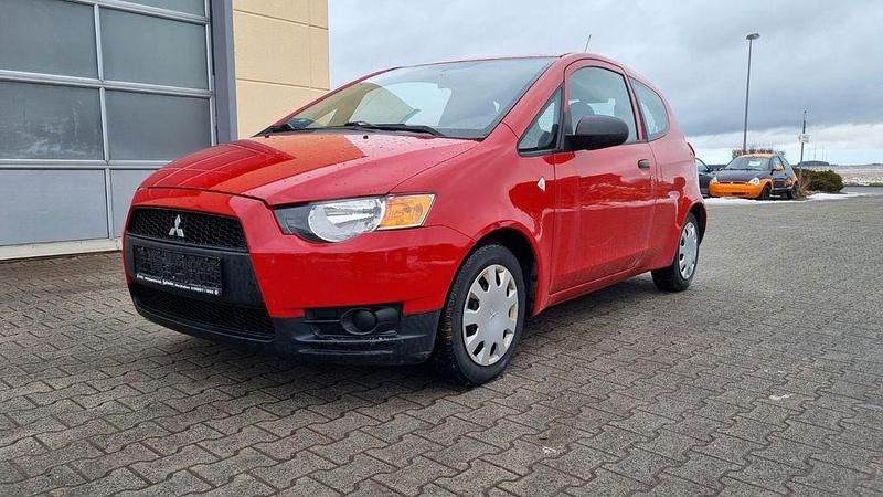 Gebraucht Mitsubishi Colt Basis 75 PS (55 kW) 2009 Rot Kleinwagen