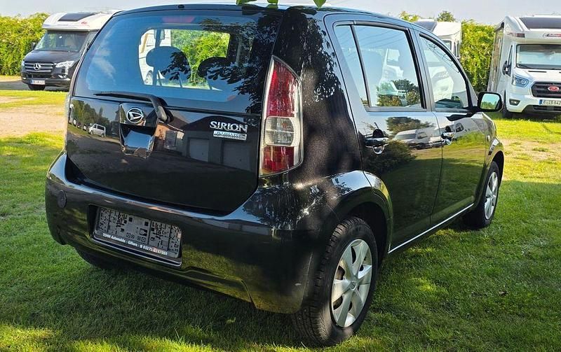 Gebraucht Daihatsu Sirion 69 PS (50 kW) 2008 Schwarz Kleinwagen