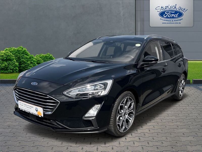 Iridiumschwarz metallic Gebraucht 2019 Ford Focus Titanium Kombi | 18.990 € - Bild 1/4