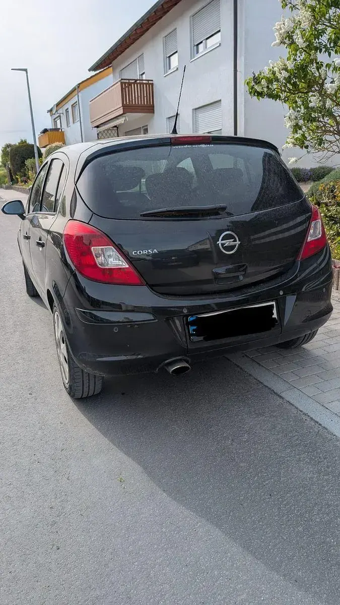 Gebraucht Opel Corsa 87 PS (63 kW) 2011 Schwarz Kleinwagen