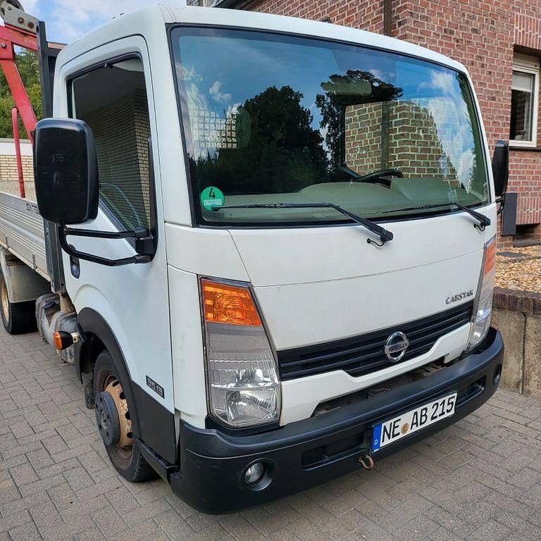 Weiß Gebraucht 2010 Nissan Cabstar Abholung | 10.000 € - Bild 1/4