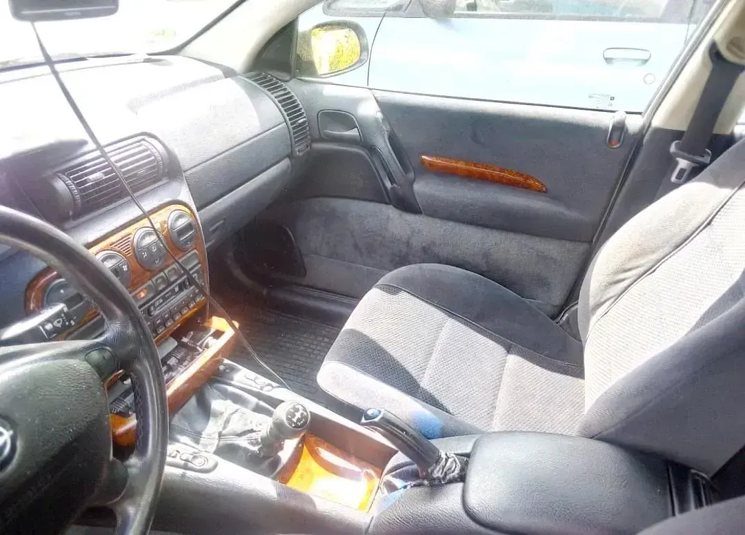 Second-hand Opel Omega 136 CP (100 kW) 1998 Argintiu Berlinǎ