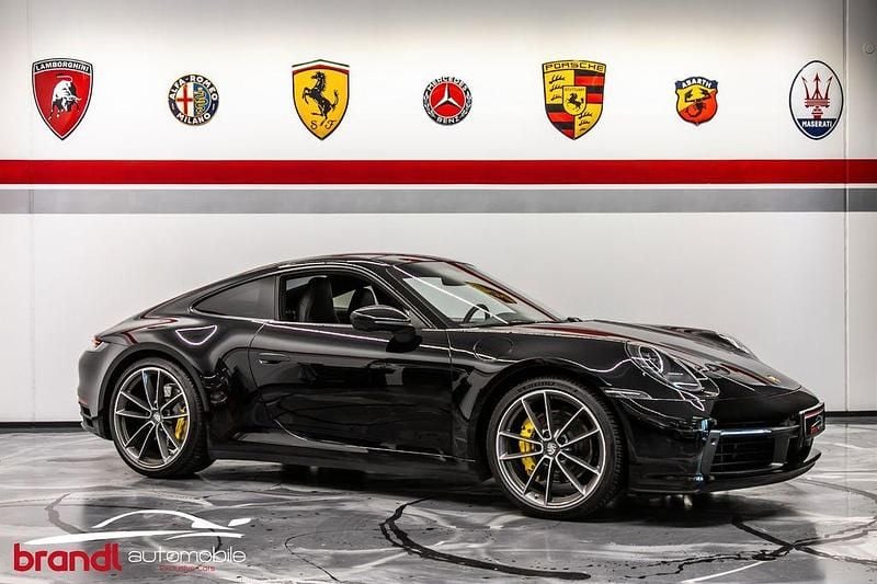Tiefschwarz Gebraucht 2021 Porsche 911 Carrera 4S Coupé | 127.890 € (Superpreis) - Bild 1/4