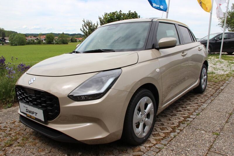 Beige Gebraucht 2024 Suzuki Swift Comfort Limousine | 19.900 € (Fairer Preis) - Bild 1/4
