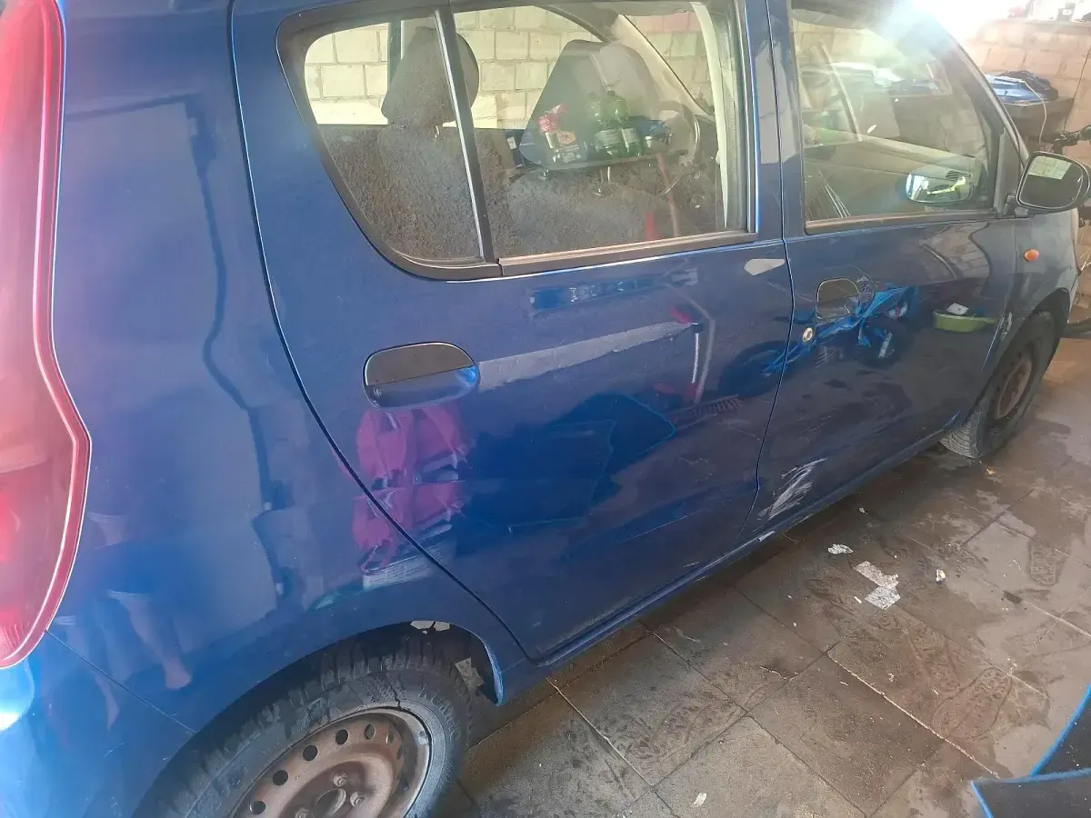 Gebraucht Daihatsu Cuore 70 PS (51 kW) 2010 Blau Kleinwagen