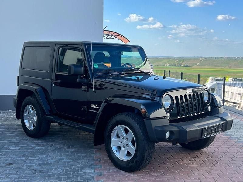Schwarz Gebraucht 2015 Jeep Wrangler Sahara SUV | 30.500 € (Fairer Preis) - Bild 1/4