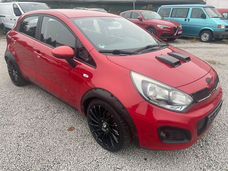 Gebraucht Kia Rio Edition 7 109 PS (80 kW) 2013 (beg) signal red (bordeaux) (metallic) Limousine