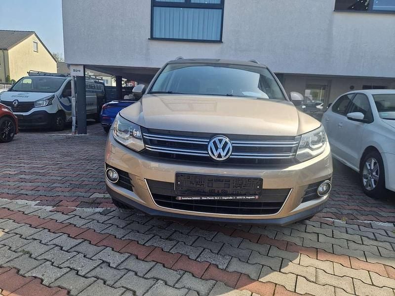 Titanium beige metallic Gebraucht 2012 VW Tiguan Sport SUV | 10.900 € (Fairer Preis) - Bild 1/4