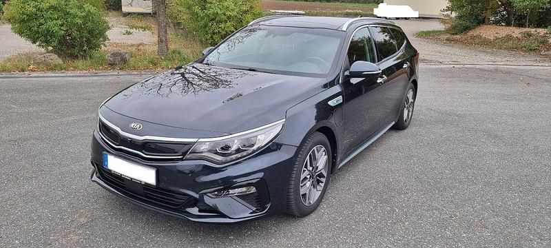 Blau Gebraucht 2019 Kia Optima Hybrid Spirit Limousine | 19.800 € (Fairer Preis) - Bild 1/4