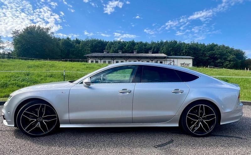 Silber Gebraucht 2011 Audi A7 Sportback S-Line Kleinwagen | 25.999 € - Bild 1/4