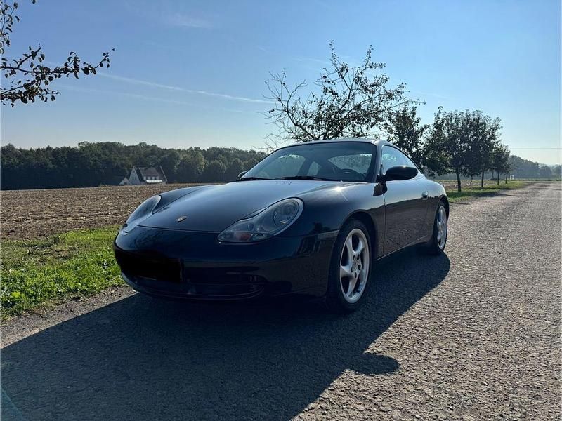 Schwarz Gebraucht 1999 Porsche 911 Carrera 4 Coupé | 35.000 € (Etwas zu teuer) - Bild 1/4