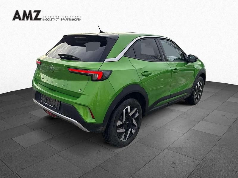 Gebraucht Opel Mokka-e Elegance 100 kW (136 PS) 2022 Matcha green/ikone gruen (metallic) SUV