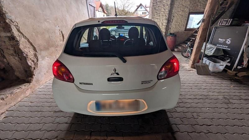Gebraucht Mitsubishi Space Star 71 PS (52 kW) 2015 Weiß Kleinwagen
