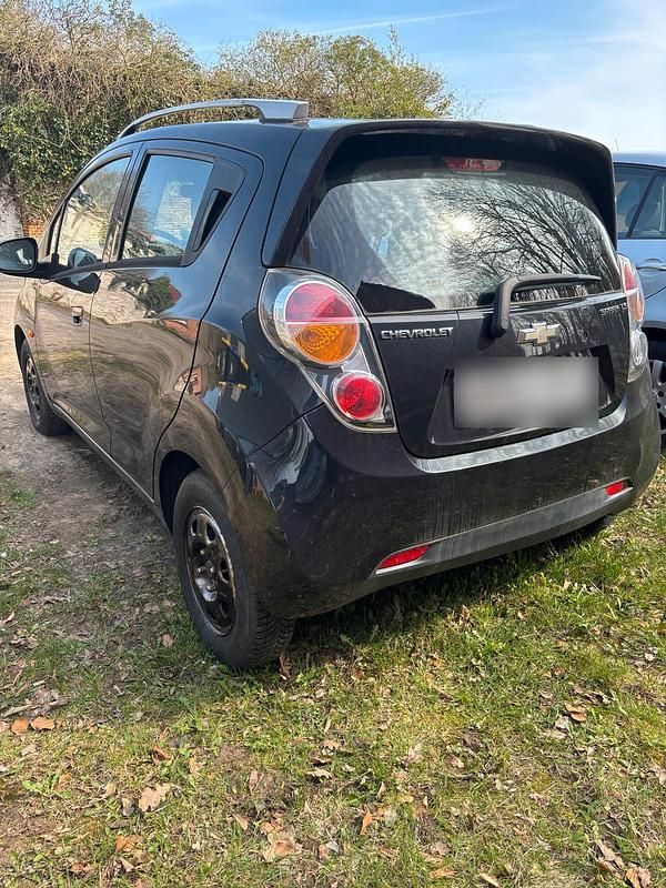 Second-hand Chevrolet Spark 82 CP (60 kW) 2011 Negru Hatchback