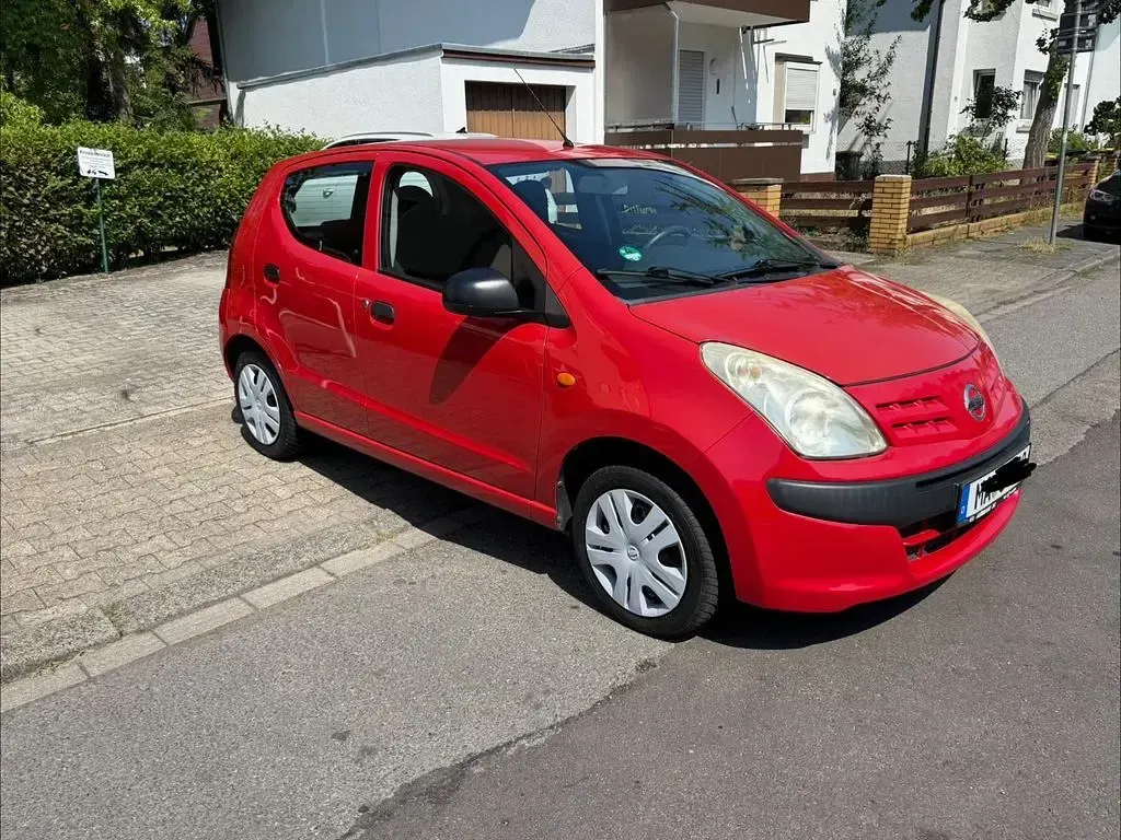 Gebraucht Nissan Pixo Acenta 68 PS (50 kW) 2010 Rot Kleinwagen