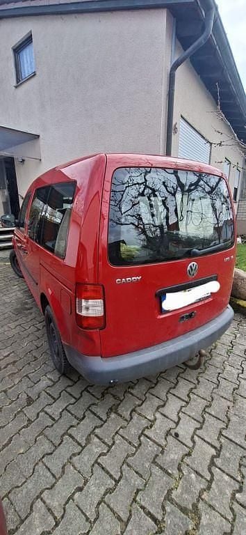 Second-hand VW Caddy Team 102 CP (75 kW) 2008 Roșu Monovolum