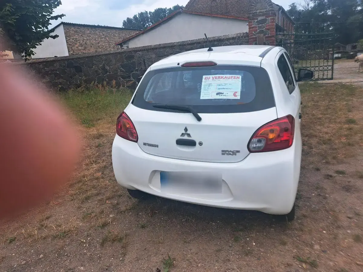 Gebraucht Mitsubishi Space Star 72 PS (52 kW) 2014 Weiß Van / Kleinbus