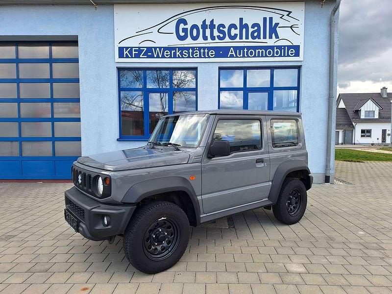 Medium gray Gebraucht 2019 Suzuki Jimny Comfort SUV | 30.490 € (Fairer Preis) - Bild 1/4