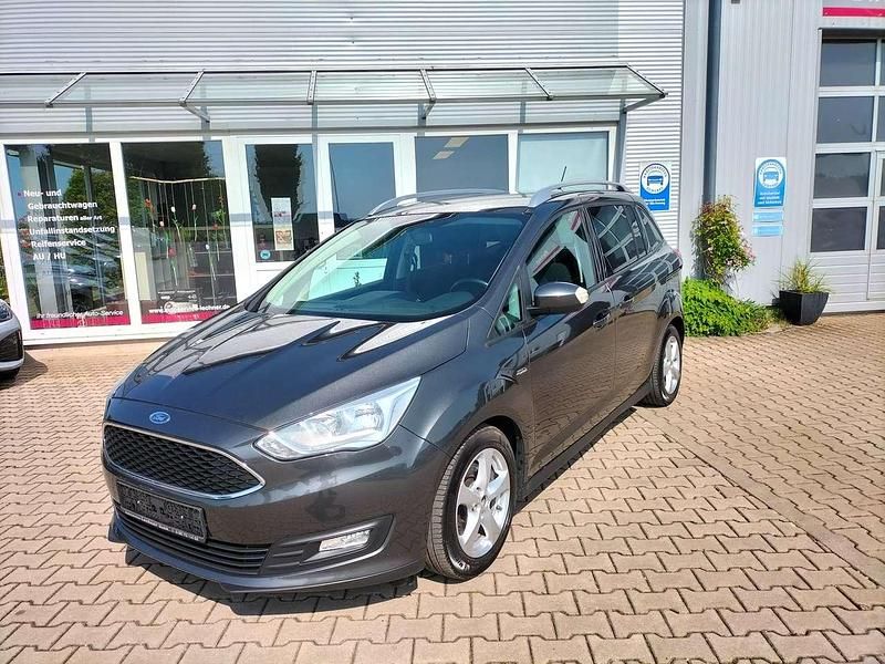 Magneticgrau (metallic) Gebraucht 2017 Ford Grand C-Max Van / Kleinbus | 11.950 € (Fairer Preis) - Bild 1/4
