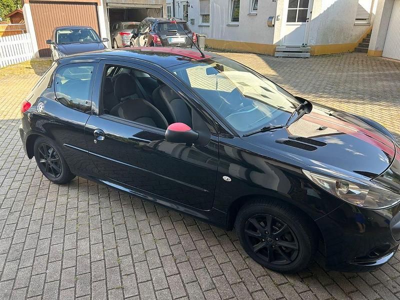 Gebraucht Peugeot 206 73 PS (53 kW) 2010 Schwarz Limousine