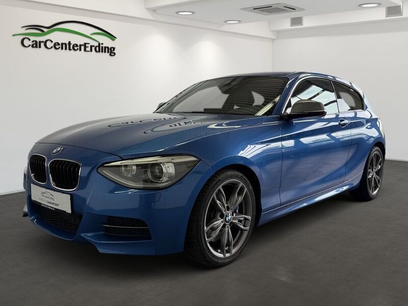 Blau Gebraucht 2012 BMW M135 Comfort Edition Kleinwagen | 11.990 € - Bild 1/4