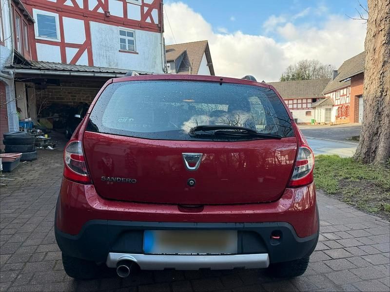 Gebraucht Dacia Sandero Stepway 85 PS (62 kW) 2012 Rot Limousine