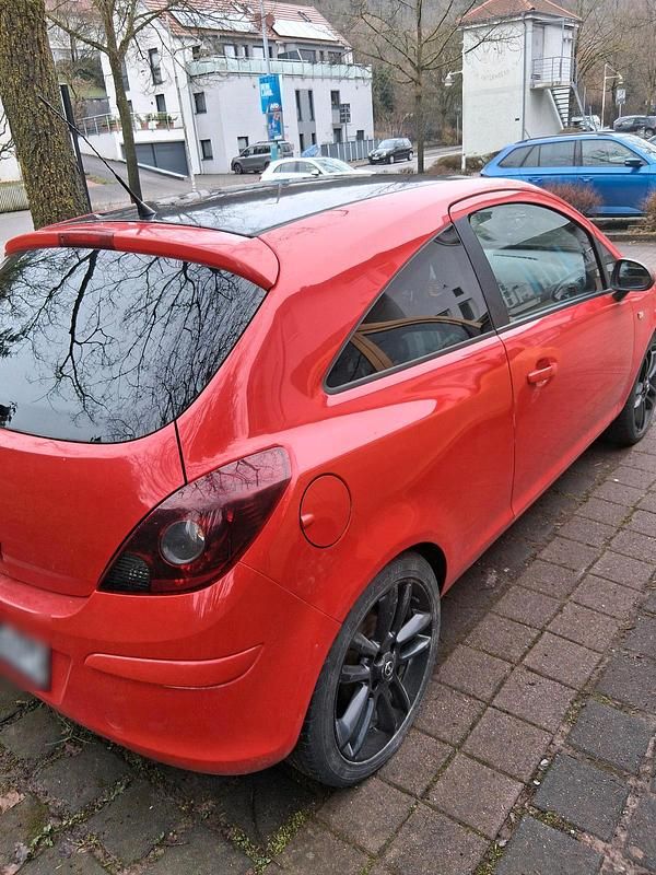 Gebraucht Opel Corsa 80 PS (58 kW) 2010 Rot Kleinwagen